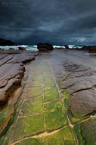 storm darkclouds sea ocean rocks texture cracks rockshelf beach whalebeach sydney nsw australia seascape