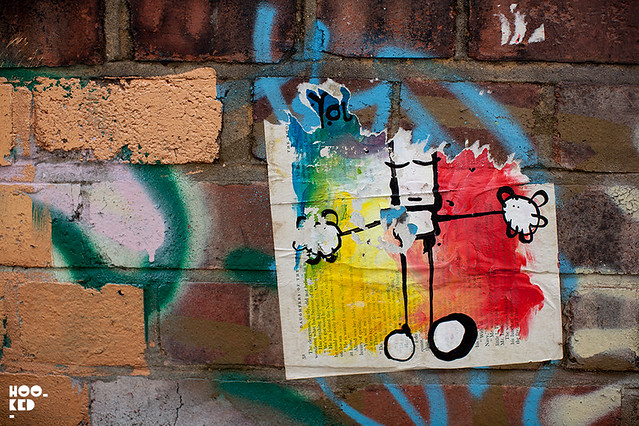 My Dog Sighs London street art paste-ups on Brick Lane, London