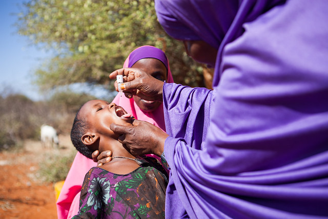 Sahro Ahmed vaccinates a child