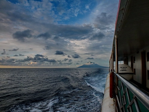 sunset sea sky mountain beautiful crimson clouds indonesia boat maluku langit utara tidore