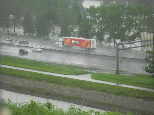 Despite a high tide about to over-run the road, a Doritos-packed trucker rushes to make the highly important delivery on time.
