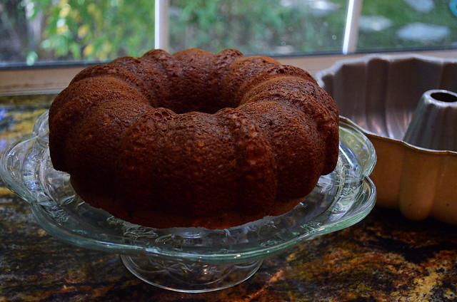 The Bundt pan has been lifted and now the cake sits on the serving platter.