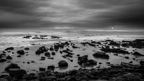 ocean light sunset newzealand cloud beach nature rock ship outdoor wave tasmansea newplymouth