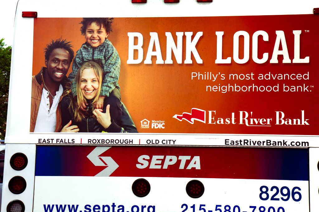 Bank-ad-with-mixed-couple-and-child--South-Broad-Street