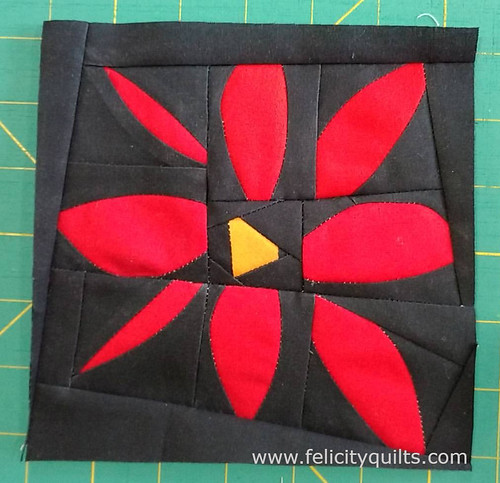 Improv blossom for @marci_girl. #beesewcial #inspiredbybeesewcial @capitolaquilter @astrangerview @entropyalwayswins @shecanquilt @aquilterstable @quiltmatters @spontaneousthreads @playcrafts