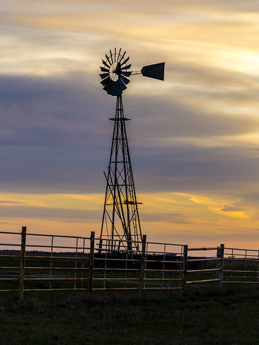 sunset usa windmill silhouette rural midwest farm kansas prairie idyllic flatland