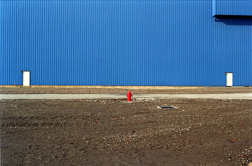 urban film analog 35mm pittsburgh minolta minoltax700 1999 symmetry warehouse firehydrant scanned homestead 1990s urbanlandscape rustbelt pittsburghpa colornegative homesteadpa