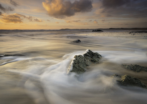 sunset seascape beach rock wales landscape coast waves peach llanddwyn anglesey newborough