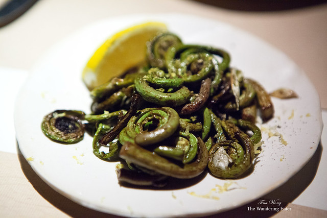 Wood oven roasted fiddlehead ferns with spring garlic and lemon