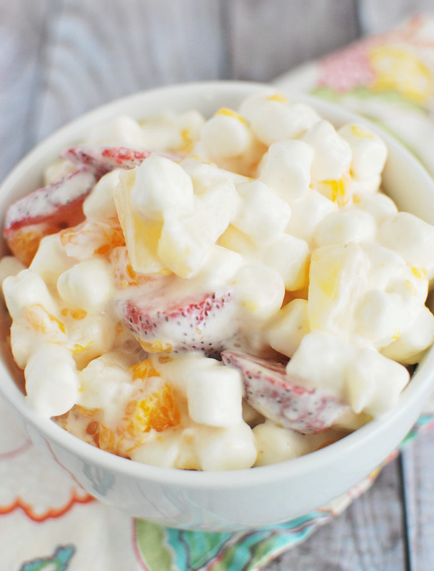 Ambrosia salad with pineapple, strawberries, mandarin oranges, and marshmallows 