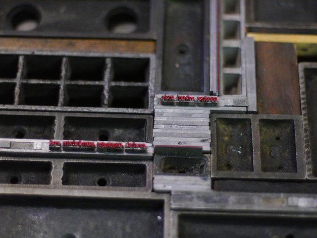 letterpress metal type inked in red