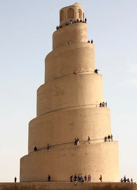 Local residents visit the Spiral Minaret of the Great Mosque in Samarra
