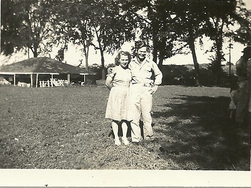 Grandma and Grandpa standing in a park