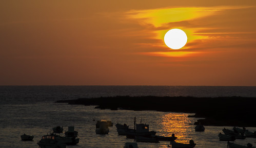 sunset sea sun sol beach atardecer mar andalucía playa sur barcas cádiz anaranjado caleta mygearandme