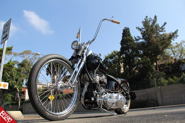 A photo of the front of the bike displaying its handlebars, headlight, and front tire