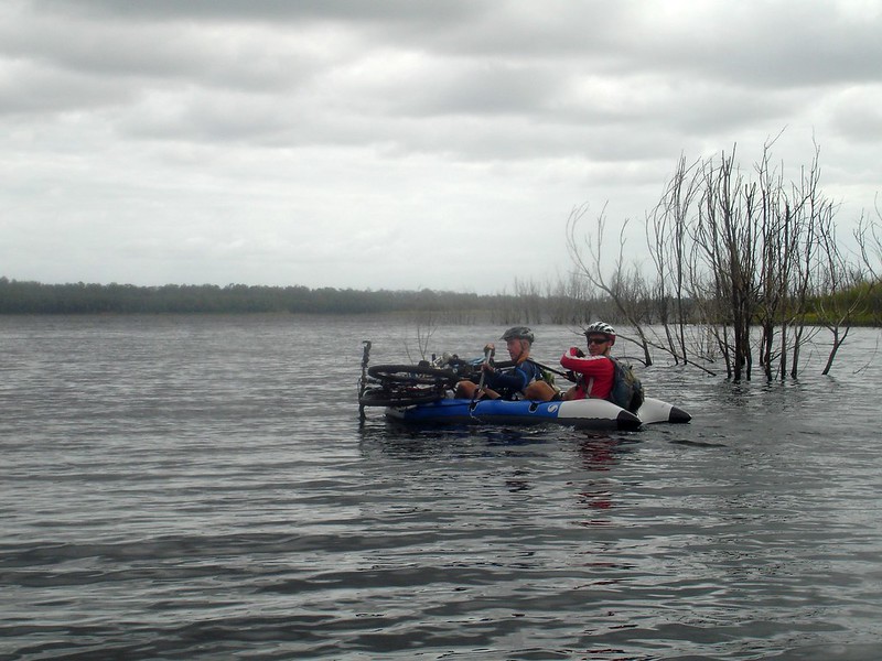 Two Mountain Bikers in a Boat