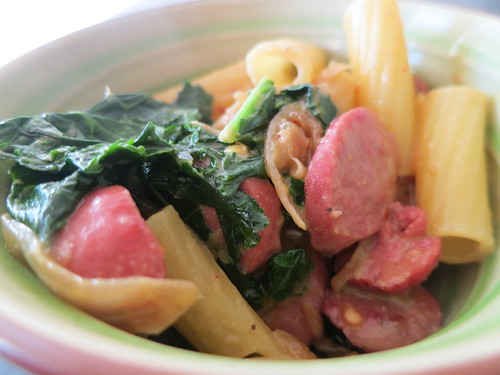 Sausage, kale, and caramelized pasta in a spicy Dijon sauce