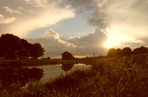 sunset reflection clouds river golden countryside scenic sunburst goldenhour cloudburst davidbailey