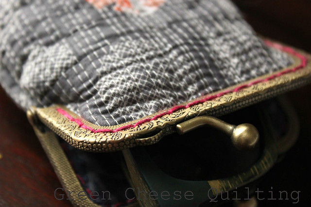 Clasp and stitching detail