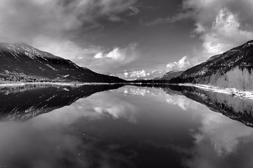 montana reservoir lake sanders county water waterreflection mountains snow winter blackwhite canoneos clounds
