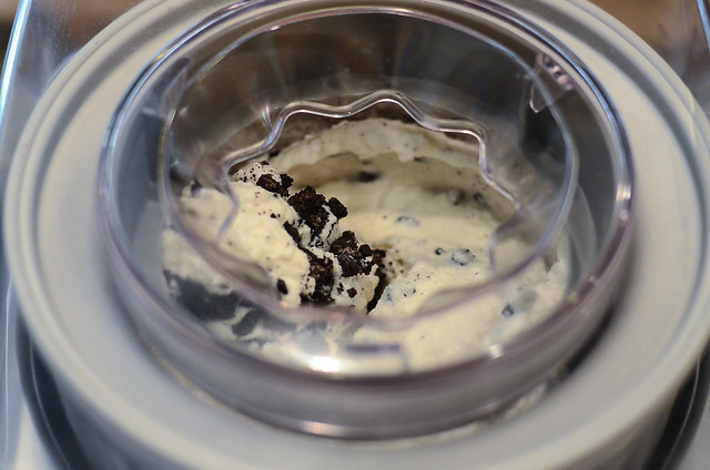 Crushed oreos have been added to the ice cream machine.