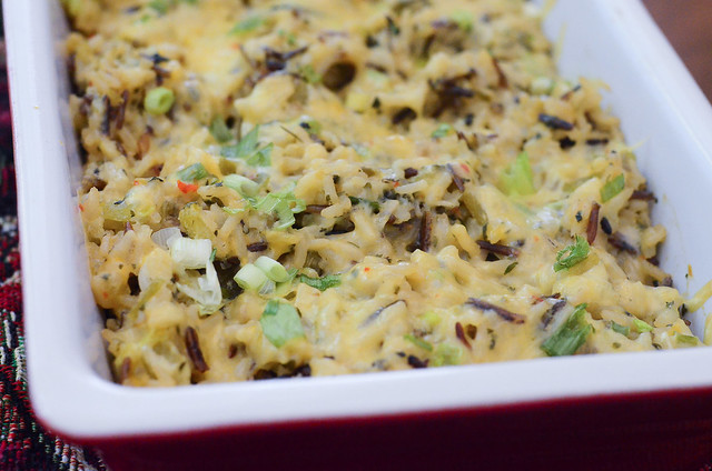 A serving dish full of Green Chile Rice Casserole.
