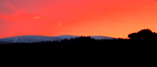 sunset snow silhouette hills