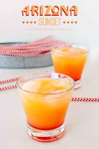 Arizona Sunset in two clear glasses with straws laying around. 