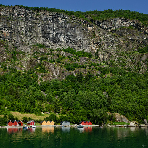 sea mountain reflection green scale water rock colorful fjord boathouse luster sognogfjordane solvorn lusterfjord lustrafjord ornes