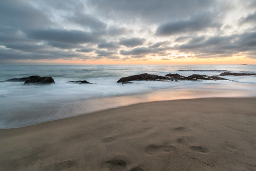 california ca longexposure sunset beach clouds sand rocks day waves cloudy lagunabeach relfections