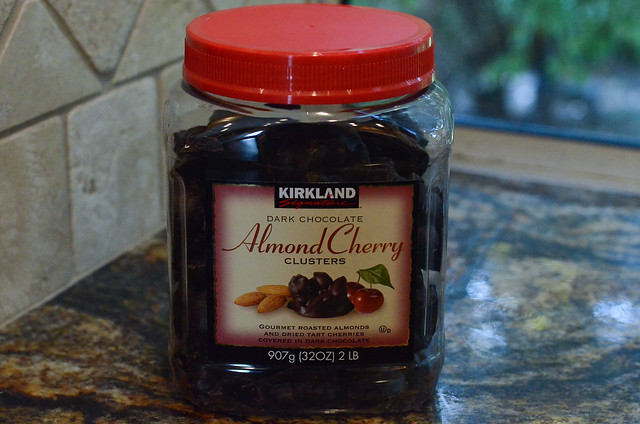 A container of Kirkland Almond Cherry Clusters.