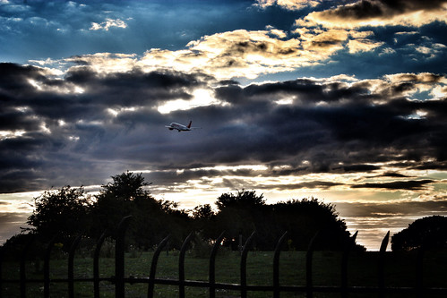 sunset summer sky clouds plane airplane countryside flying cloudy