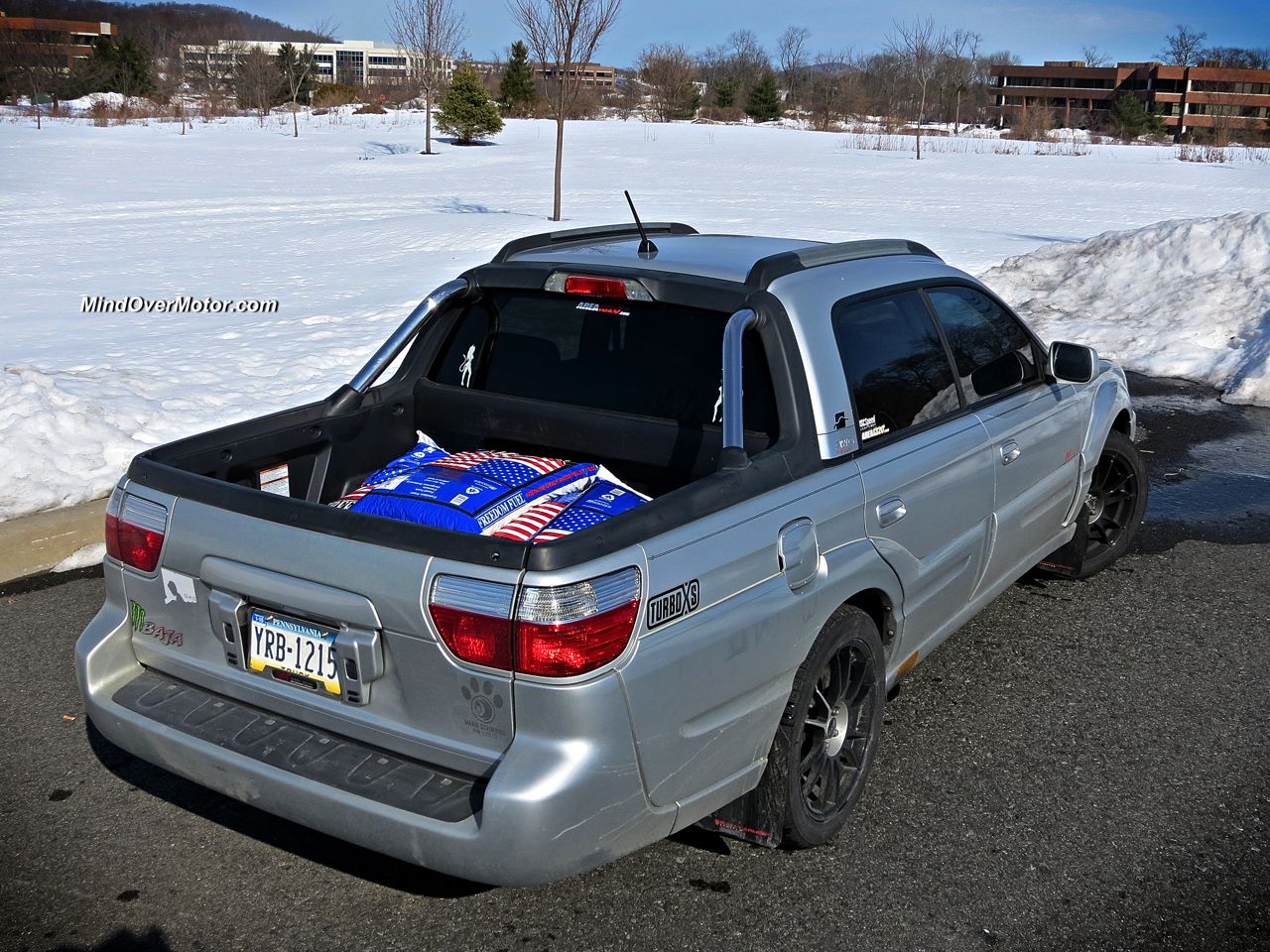 Subaru Baja From Hell loaded up with wood chips