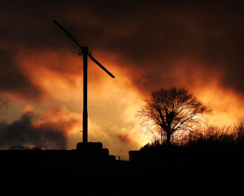 sunset windturbine silhouettes silhouette clouds gate bales