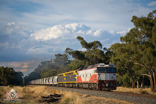 train locomotive freight grain country victoria diesel logistics goldfields qube storm clouds sunset