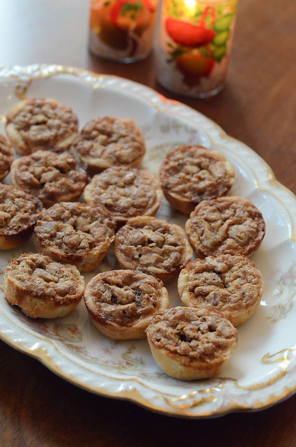 A china tray filled with Pecan Tarts.