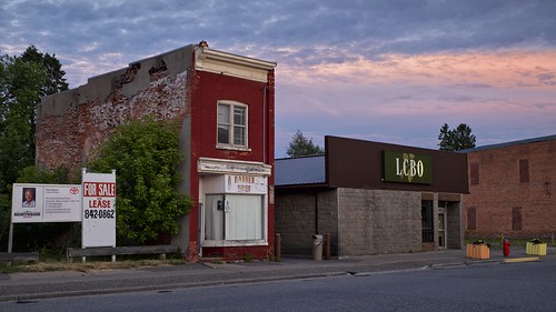 sunset summer ontario colour building brick architecture mainstreet closed downtown sidewalk barbershop vacant storefront northernontario lcbo thessalon 16x9crop tonalcontrast liquorcontrolboardofontario 03ndsoftgrad leeseven5 fujixt1 gnd1s