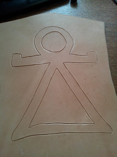 Tanit symbol carved in leather