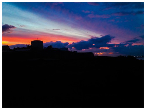 blue sunset red sky dublin sun colour clouds landscape rocks nofilter iphone dunlaoghaire