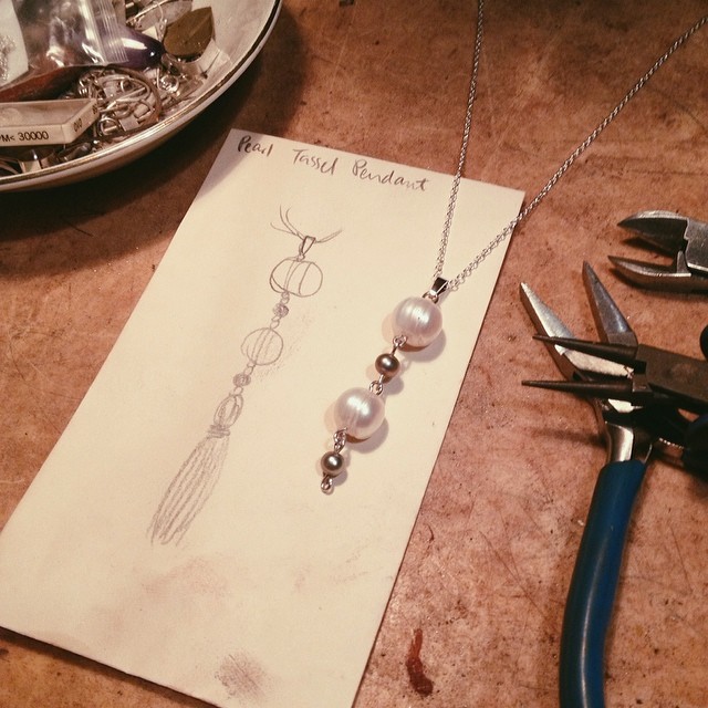 Sneak peek! I've been working on a handmade sterling silver, white and grey pearl tassel pendant, as part of a collection for Mother's Day. I'm just waiting for my order of black silk tassels to arrive. I think they're going to be very feminine and beauti