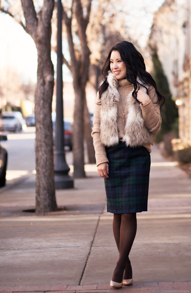 cute & little blog | fur vest, chunky turtleneck, plaid pencil skirt, brown tights, nude pumps, tassel necklace outfit