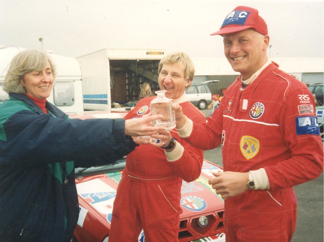 1996 Champion Dave Walker (centre) and Richard Sikes look delighted to receive the previous year’s shared drive award from Christine Hodgkin.