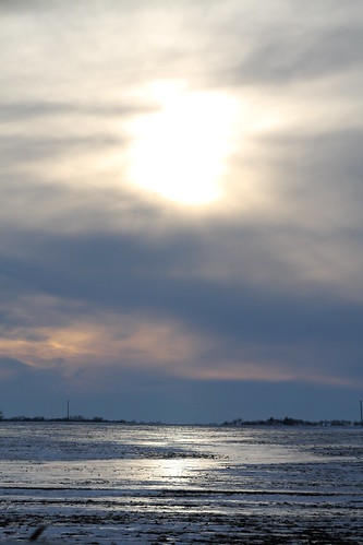 sunset snow ice field clouds illinois flag center