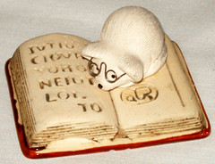 073a Mouse on book
