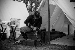 union soldier cleaning rifle