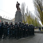 Police protecting the statue of Lenin