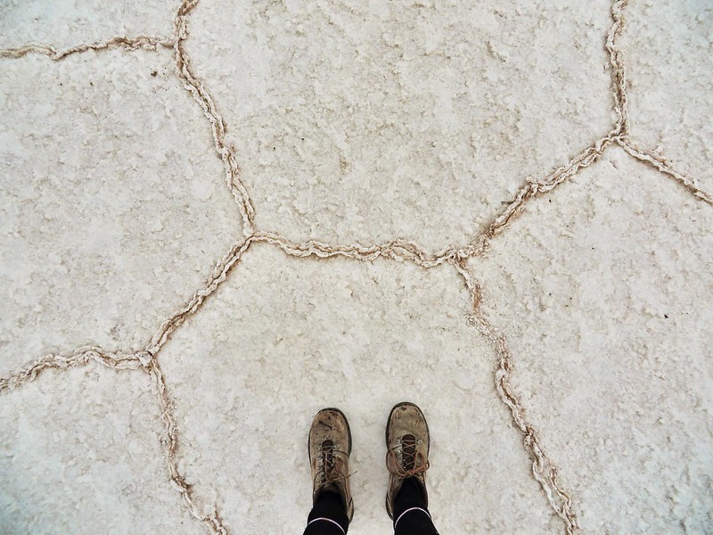 Flora's feet on the salt flats in Bolivia
