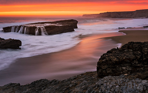 ocean california ca sunset red orange santacruz rocks day waves cloudy cliffs bayarea holeinthewall pantherbeach