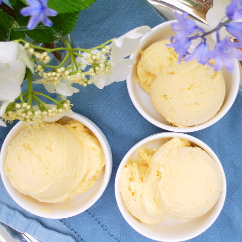 Overhead shot of passion Fruit Ice Cream in 3 small bowls.