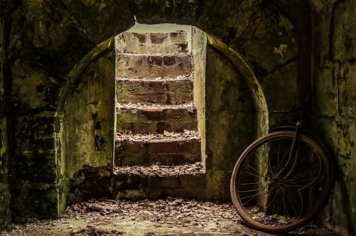 old light red brown green castle broken bicycle wheel stairs germany landscape bavaria photo trapped nikon arch escape spokes picture tire indoors rusted walls bent remembrance rim innertube cracked gojira deformed misshapen arched lichtenau d7000 archersperch